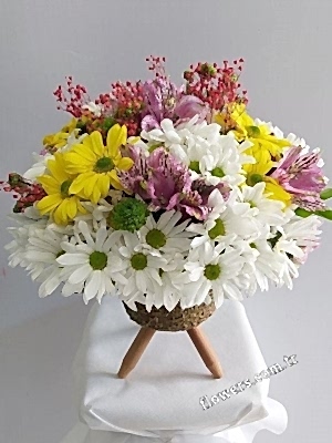Wildflowers and White Roses In Vase